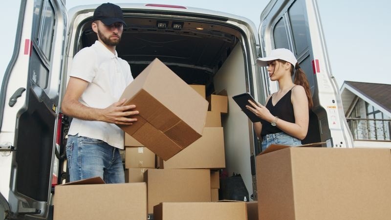 UW Moving crew loading boxes into the moving truck in Fort Pierce